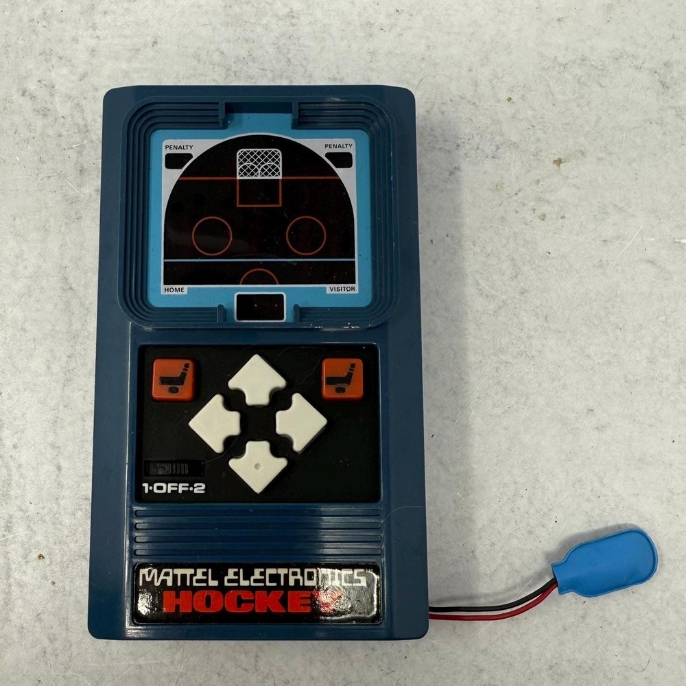 Vintage 1970s Electronic Hockey game handheld red LED digital light and‎ sound